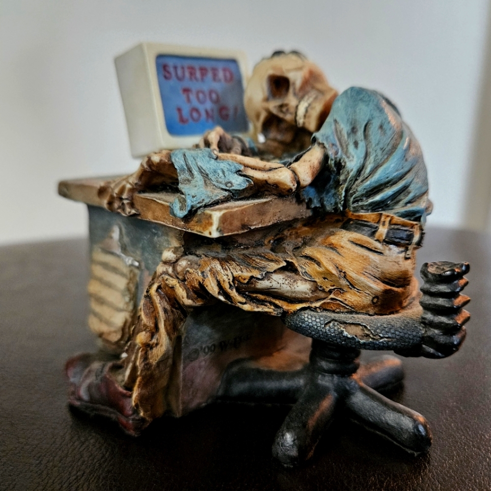 Surfed Too Long Figurine